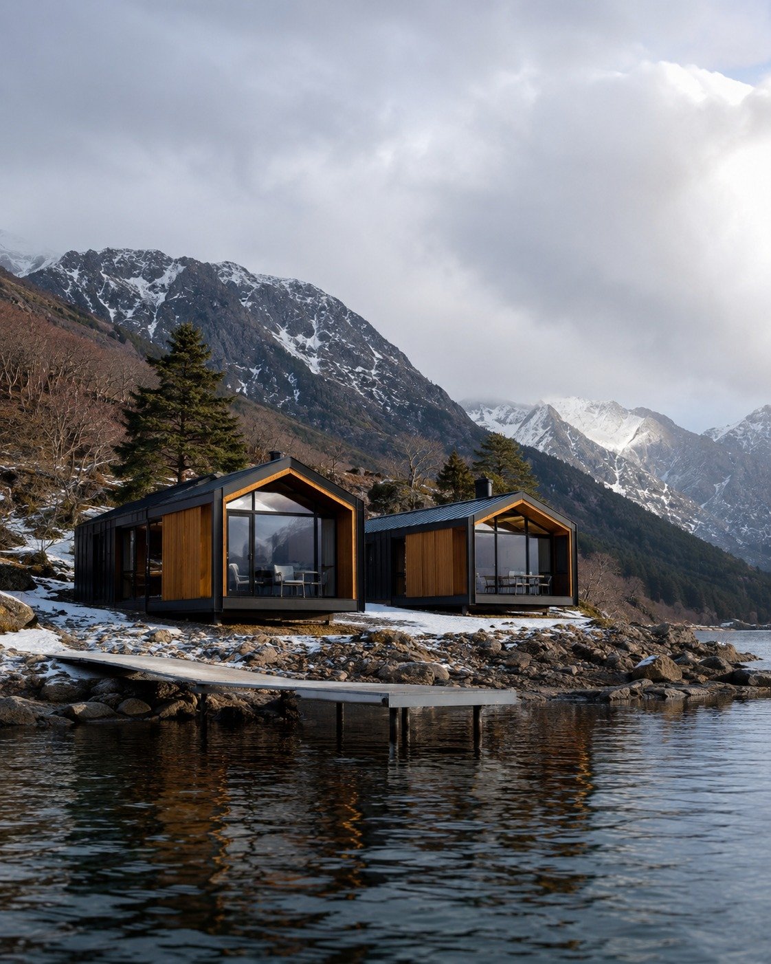 Complejo de unidades modulares contemporáneas junto a un lago